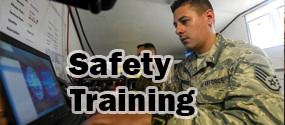 Safety training graphic depicting military member taking online training.